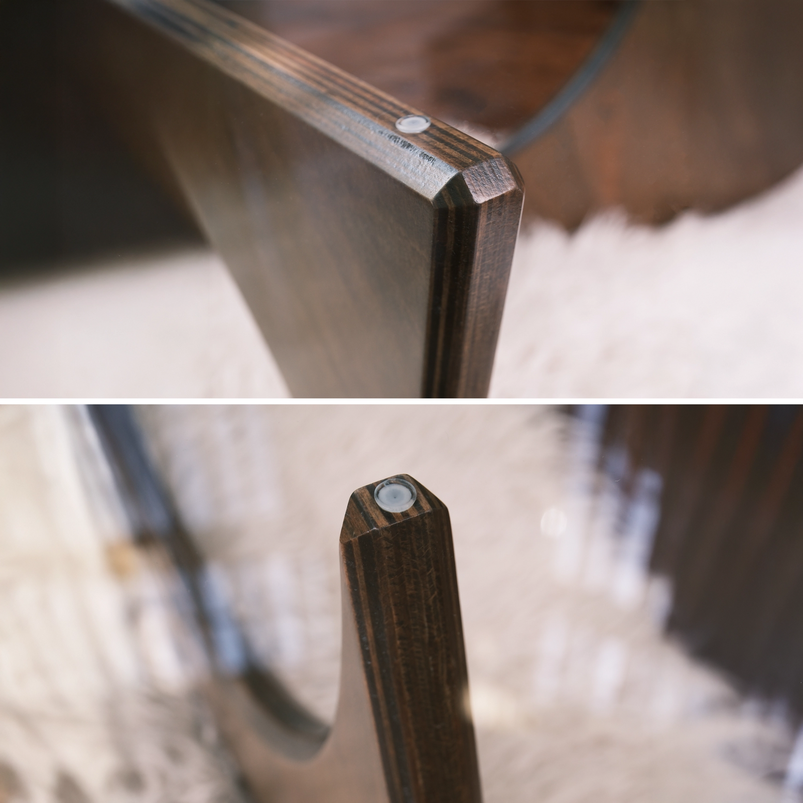 Detailansicht des geschwungenen Couchtisch-Fußes aus Schichtholz mit Glasplatte auf Teppichboden