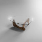 Designer-Couchtisch mit nierenförmiger Glasplatte und skulpturalem Holzgestell im modernen Stil